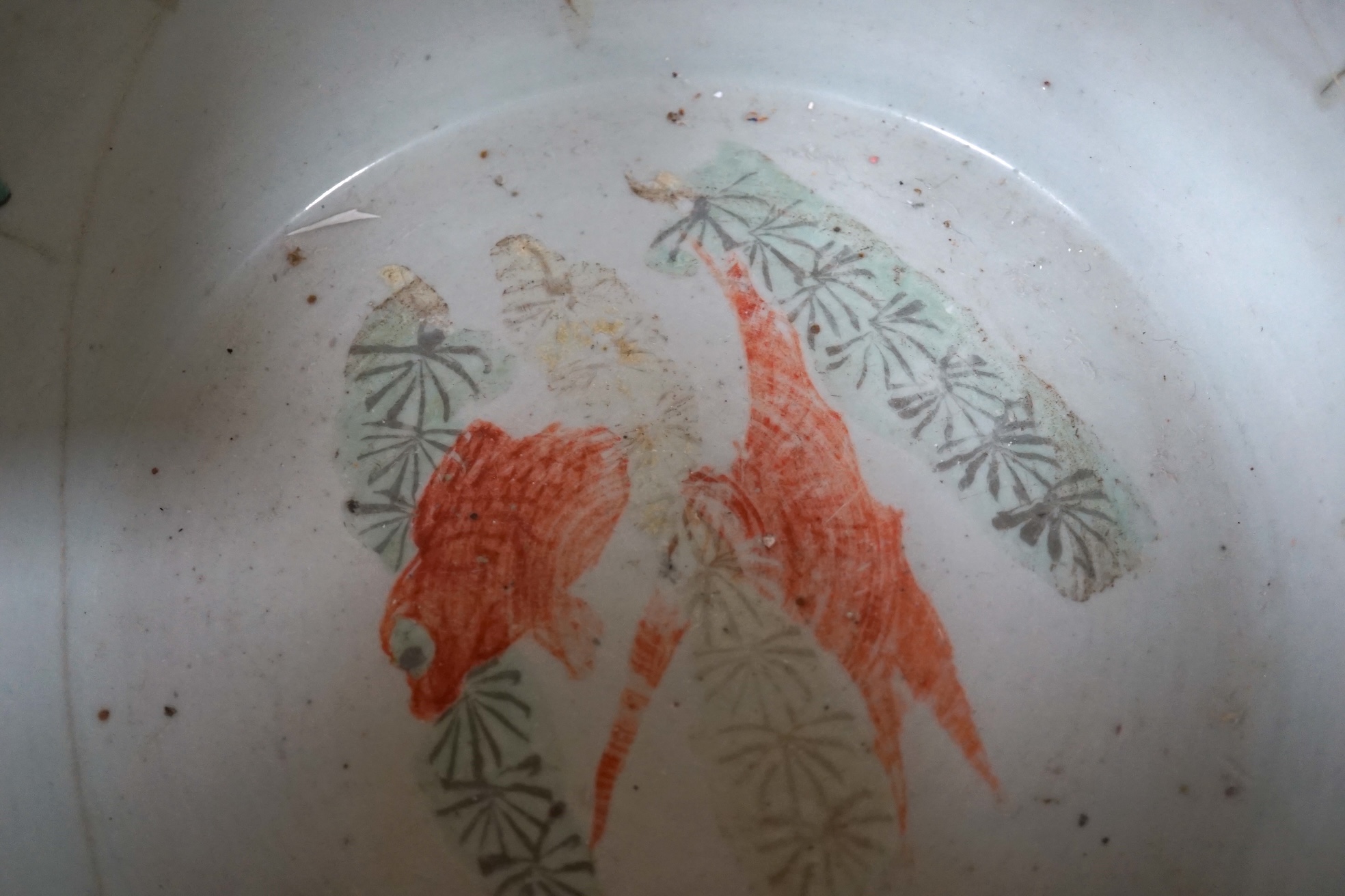 A Chinese famille rose goldfish bowl, Guangxu period, 25cm high. Condition - repaired